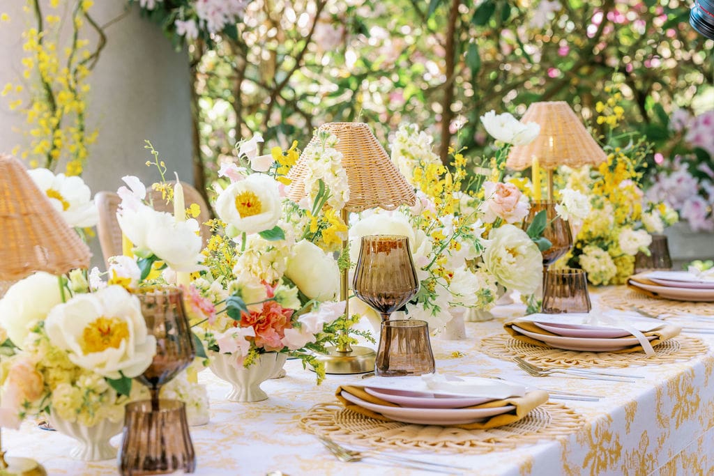 Hycroft Manor wedding reception tablescape with lush floral centrepieces and candlelight — luxury wedding photography Vancouver by Amaire & Co.